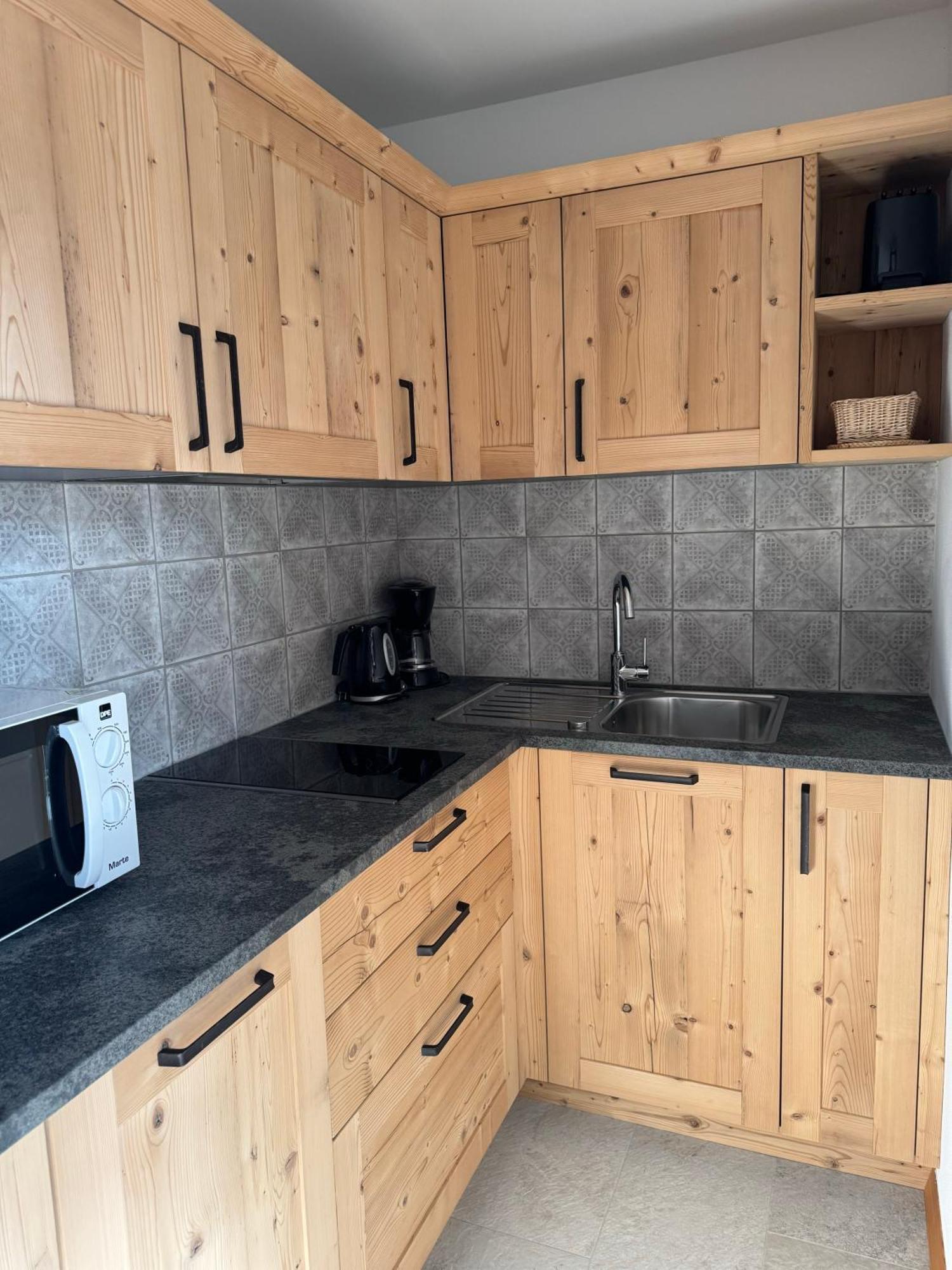 Huber Unterm Baum Apartment Лагундо Стая снимка